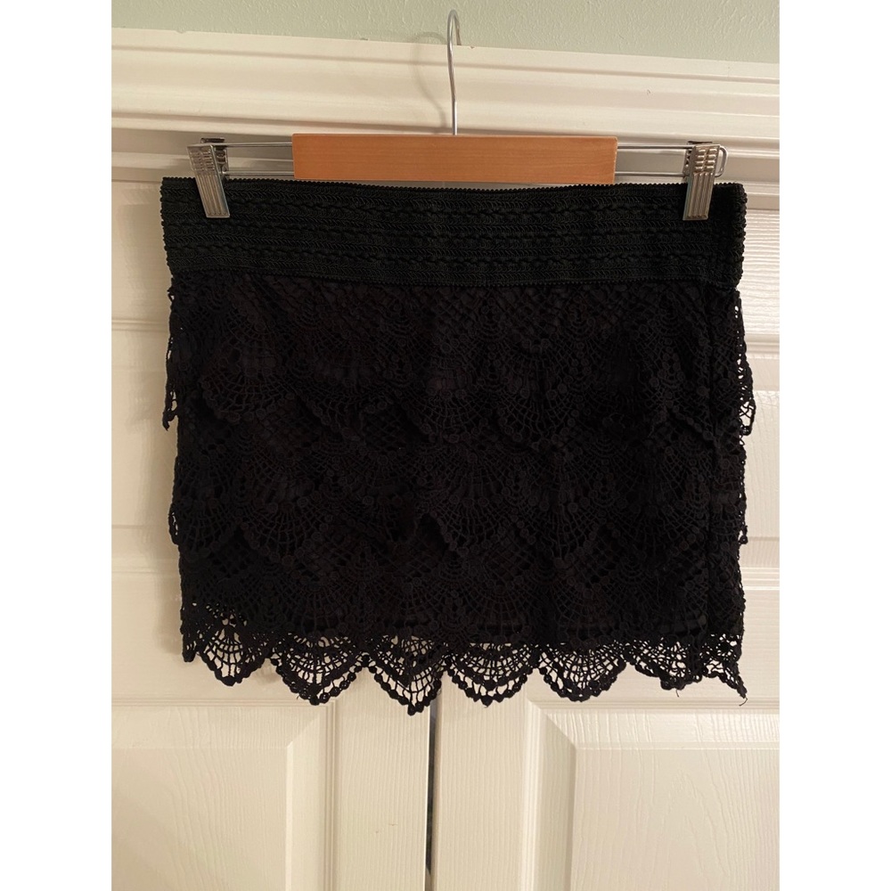 Black lace mini skirt